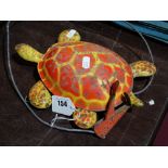 A Vintage Hand Operated Walking Turtle Toy