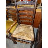 A Rush Seated Ladder Backed Country Chair