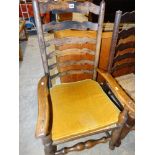 An Antique Rush Seated & Ladder Backed Country Elbow Chair