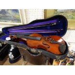 A Cased Violin And Two Bows, Bows Unmarked, The Violin Bearing A Renovation Label Dated 1925, One
