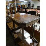 An Edwardian Oak Two Tier Occasional Table