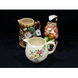 A Staffordshire Pottery Tavern Figure Toby Jug, Together With A Majolica Jug Etc (3)