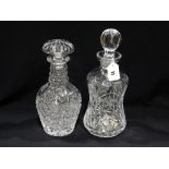 Two Circular Based Cut Glass Decanters