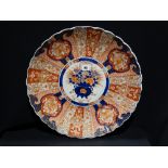 A Large 19th Century Imari Scallop Edge Charger, With Centre Flower Urn Panel, 18" Dia