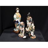 A Group Of Four Oriental Ceramic Geisha Girl Figures In Brightly Coloured Dress (All AF)