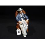 A Royal Doulton Figure "Taking Things Easy" Hn2677