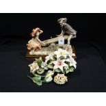 A 20th Century Capodimonte Style Group Of Figures On A See-Saw Together With Further Floral Pottery