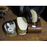 A Silver Backed Gentleman`s Clothes Brush & Three Others