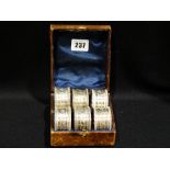 A Cased Set Of Six Silver Plate Napkin Rings