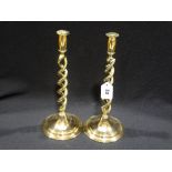 A Pair Of Brass Circular Based Open Twist Candlesticks, 12" High
