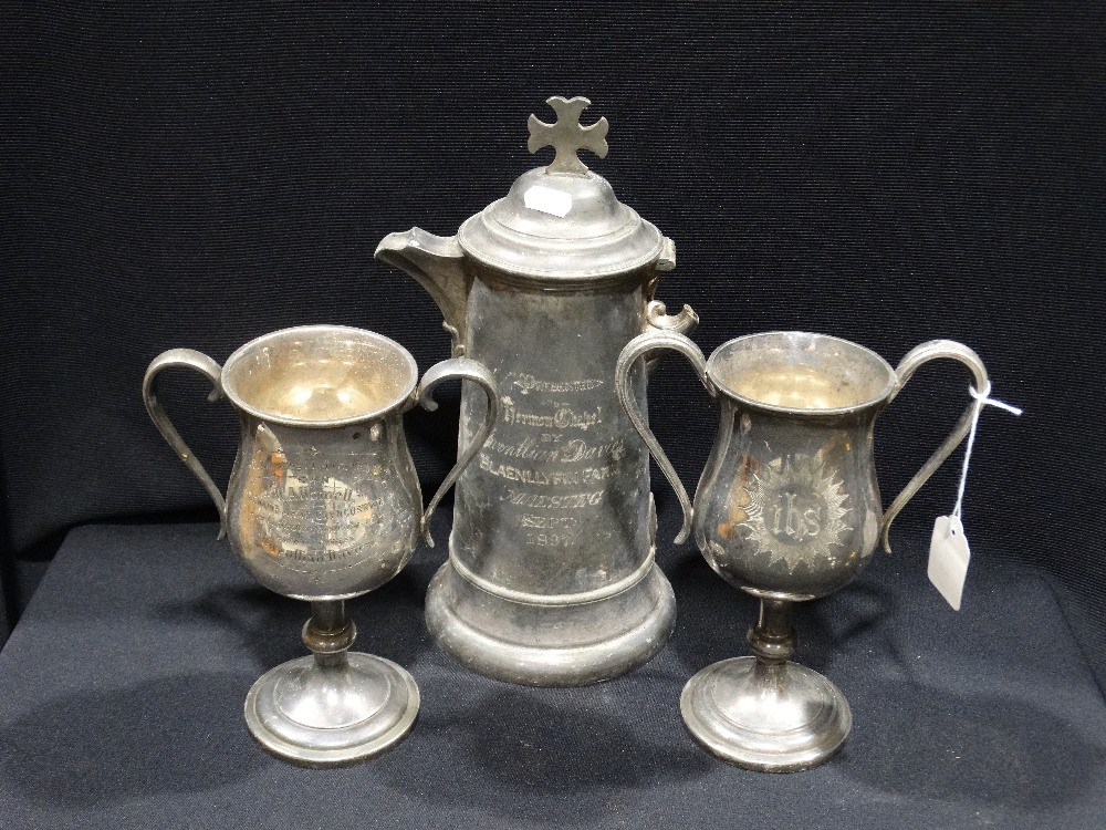 Two Circular Based Two Handled Church Cups, Together With A Communion Jug