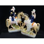 A Pair Of Staffordshire Pottery Equestrian Figures