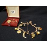 A 9ct Gold Bracelet & Charms, Including A 1894 Half Sovereign, 120grm All In