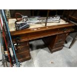 An Early 20th Century Polished Oak Pedestal Desk