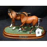 A Royal Doulton Matt Finish Horse Group On A Plinth, Spirit Of Love