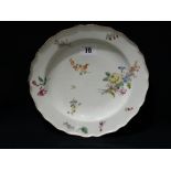 A Circular Chelsea Porcelain Dished Plate With Painted Floral Sprays, Red Anchor Mark To The Base,