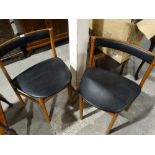 A Pair Of Retro Teak Dining Chairs