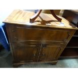 A Reproduction Mahogany Finish Two Door Cabinet