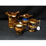 Four Copper Lustre Pottery Jugs