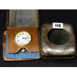 A Silver Fronted Pocket Watch & Stand, Together With A Vintage Travel Clock