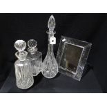 Three Cut Glass Whisky & Narrow Necked Decanters, Together With A Glass Photograph Frame