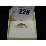 A 9ct Gold Diamond Solitaire Ring