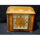 An Art Deco Period Wood Veneer Encased Mantel Clock