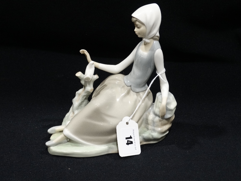 A Lladro Porcelain Group Of Girl & Dove