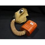 A 2nd World War Gas Mask & Cannister
