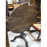 A Circular Topped Georgian Oak Tripod Tilt Table