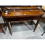 An Antique Mahogany Fold Over Tea Table