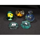 Five 20th Century Glass Paperweights To Include Mdina
