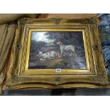 A 20th Century Gilt Framed Study Of Three Sporting Dogs In A Landscape Setting