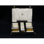 A Continental Silver Cased Three Piece Gents Brush Set