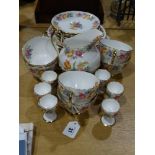 A Twenty-Eight Piece New Chelsea China Floral Decorated Tea Set