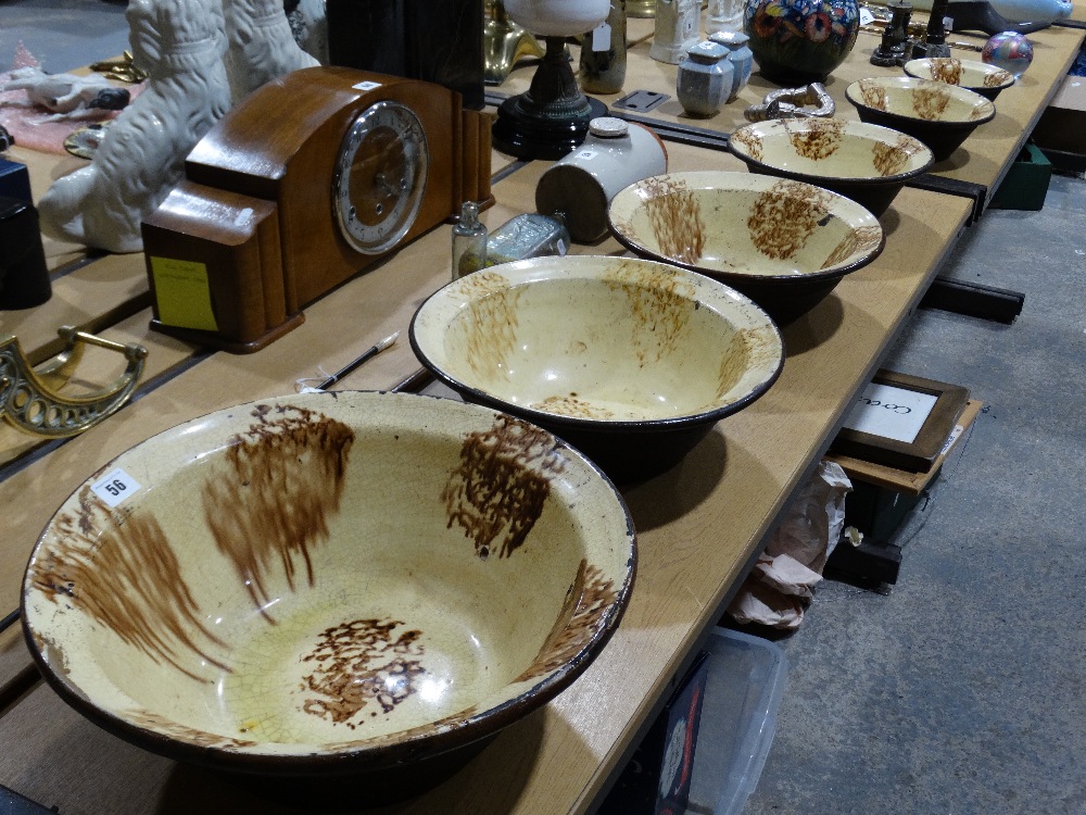 An Excellent & Rare Set Of Six Graduated Slip Glazed Circular Stoneware Dairy Bowls, The Largest