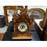 An Edwardian Oak Encased Mantel Clock