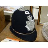 A Rare Bermuda Constabulary Policeman`s Helmet & Cap Badge