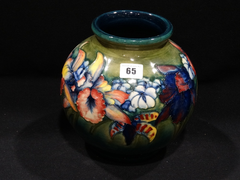 A Circular Based Green Ground Moorcroft Pottery Bulbous Vase, With Floral Band, Signed To The Base,