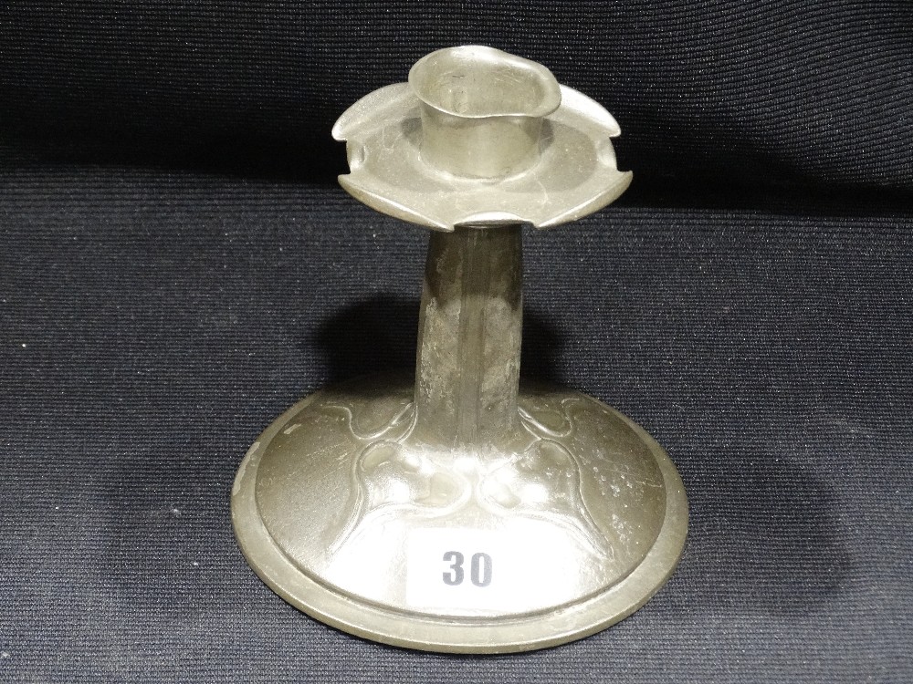 In The Manner Of Liberty`s Tudric Pewter A Circular Based Candlestick With Stylized Decoration, 5"