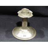 In The Manner Of Liberty`s Tudric Pewter A Circular Based Candlestick With Stylized Decoration, 5"