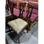 A Set Of Four Edwardian Shield Back Dining Chairs