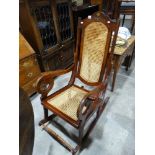 A 20th Century Cane Seated & Brass Inlaid Rocking Chair