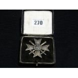 A German War Merit Cross With Swords In Presentation Box