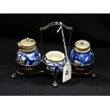 An Early 20th Century Blue & White Transfer Decorated Three Piece Condiment Set Within A Plated