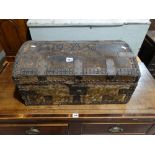 An Antique Animal Skin Covered Studded Travelling Chest