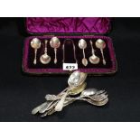 A Cased Set Of Seven Silver Teaspoons & Sugar Tongs, Together With A Bundle Of Further Spoons