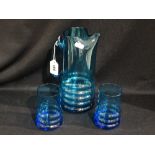 A Whitefriars Blue Glass Cordial Jug & Two Glasses