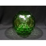 A Green Glass Dimple Decorated Vase