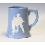 Cricket - Dartmouth Pottery Blue and White Tankard with raised cricketer design to body, good
